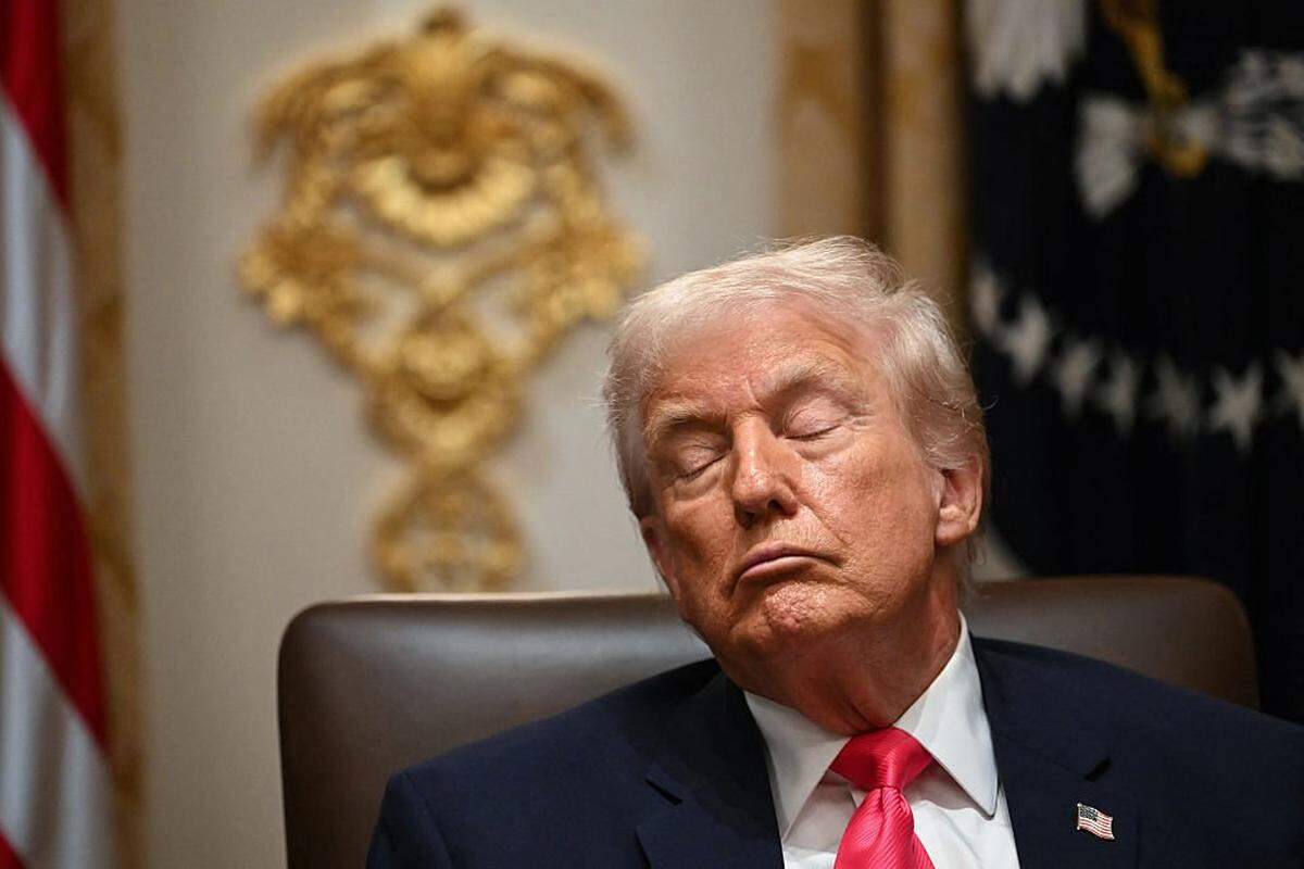 US President Donald Trump attends a Cabinet Meeting in the Cabinet Room of the White House in Washington, DC on December 2, 2025. (Photo by ANDREW CABALLERO-REYNOLDS / AFP via Getty Images)