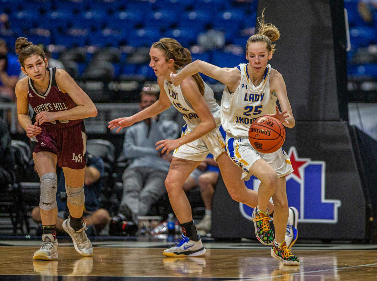 Chelsea Lott starts a fastbreak against the Lady Mustangs of Martin’s Mill during the Texas Class 2A girls basketball championship in the Alamodome in San Antonio in 2021. Lipan won 44-39.