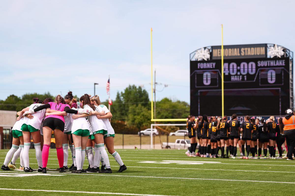 Southlake Carroll players gather in a circle before facing Forney in a UIL Class 6A Division 2 girls soccer state semifinal on Saturday, April 4, 2026, at Memorial Stadium in Mesquite, Texas..