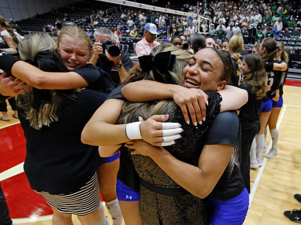 Byron Nelson Sophee Peterson (10) cries as she hugs head coach Brianne Groth after winning the UIL 6A D2 State Final volleyball match at Curtis Culwell Center in Garland Texas, Saturday, Nov. 23, 2024.