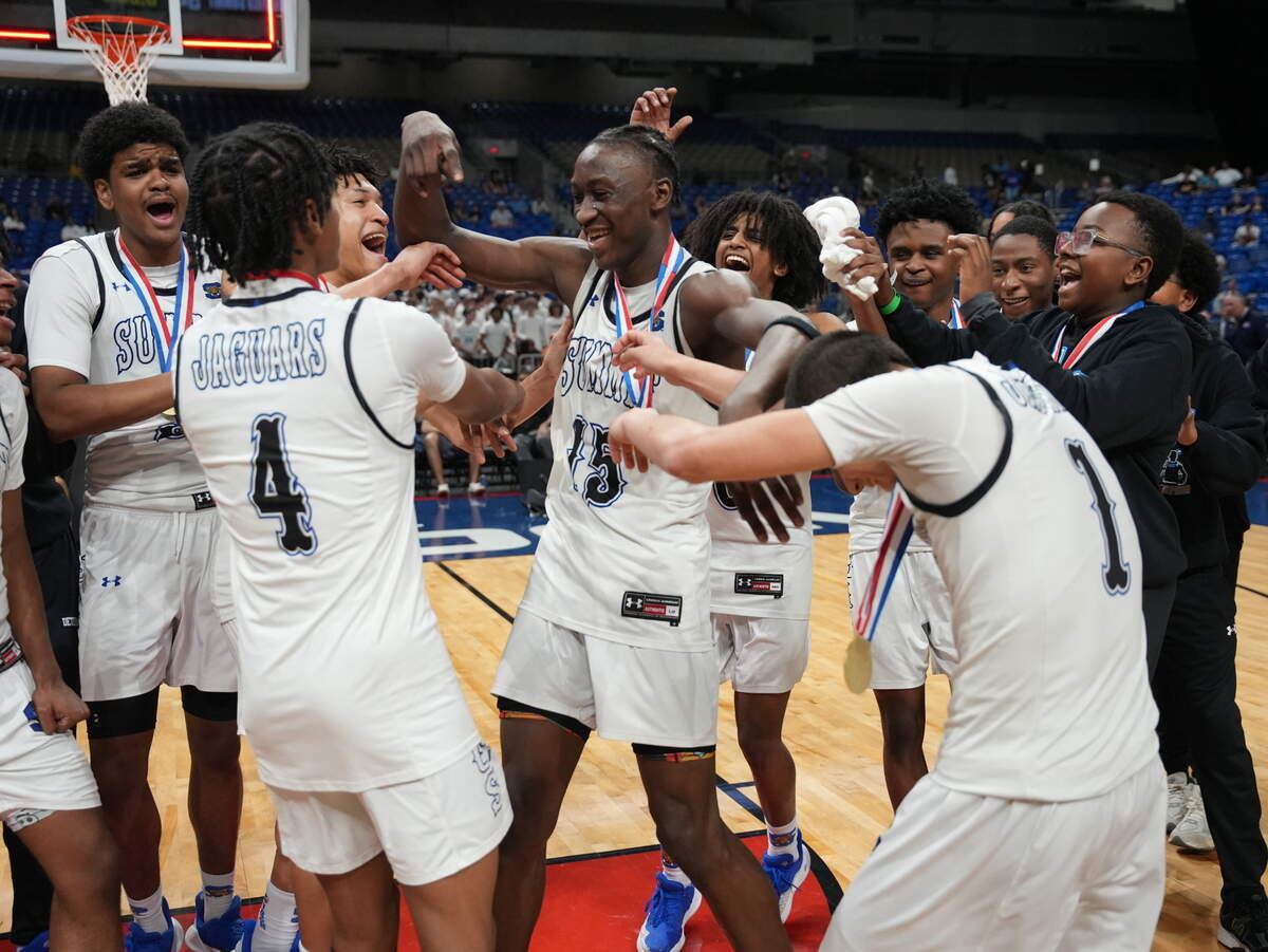 Mansfield Summit’s Ian Sedah is mobbed by his teammates after winning the Class 5A Division 2 state championship game MVP against Missouri City Marshall on Saturday, March 8, 2025 at the Alamodome in San Antonio, Texas. Summit defeated Marshall 54-47.