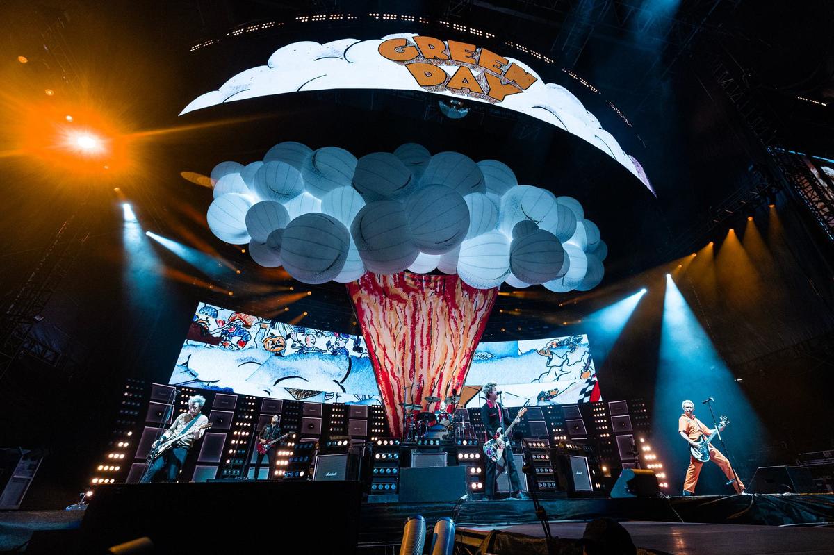 Members of Green Day perform on stage during “The Saviors Tour” at Globe Life Field in Arlington on Wednesday, Sept. 11, 2024.
