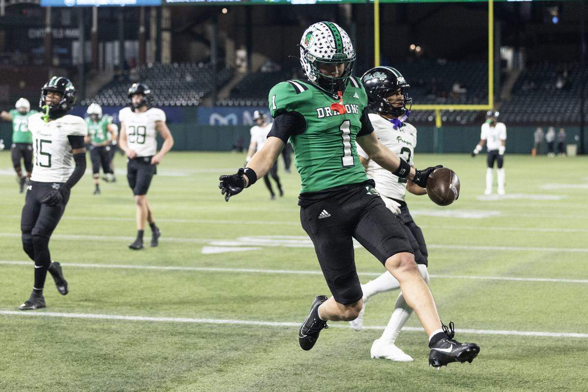Southlake Carroll wide receiver Brock Boyd (1) celebrates after scoring a touchdown in the first half of the UIL Division II Regional playoff game at Choctaw Stadium in Arlington on Friday, Nov. 28, 2025.