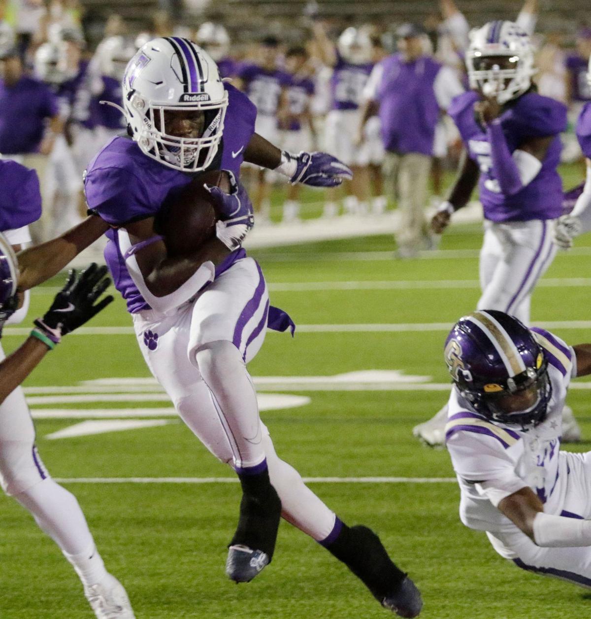 Pashal’s Marquez Dean scores a touchdown during a UIL football game at Farrington Field Stadium on Thursday, October 4, 2024.
