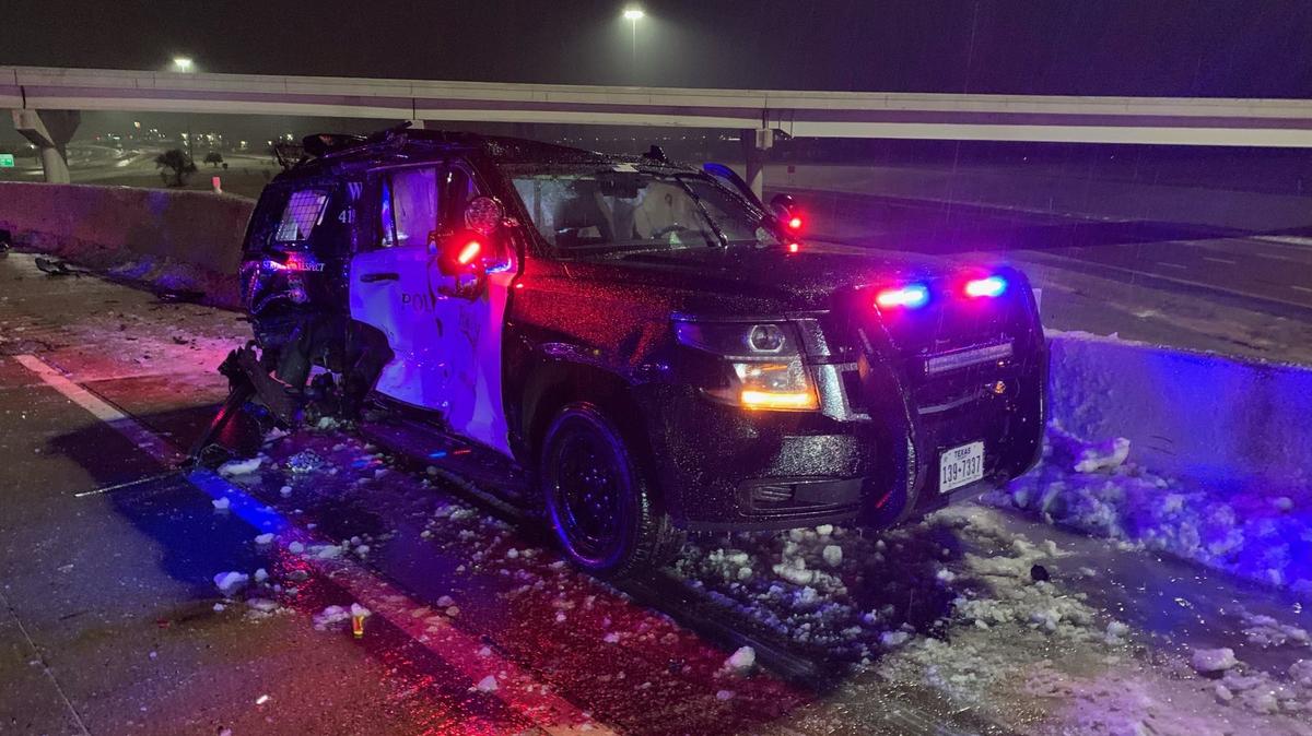 The Fort Worth Police Department said two officers were responding to an accident on I-20 early Thursday morning, Feb. 2, 2023, when an 18-wheeler jackknifed into one of the patrol cars. Shortly after the officer got out, two more 18-wheelers hit the police SUV.