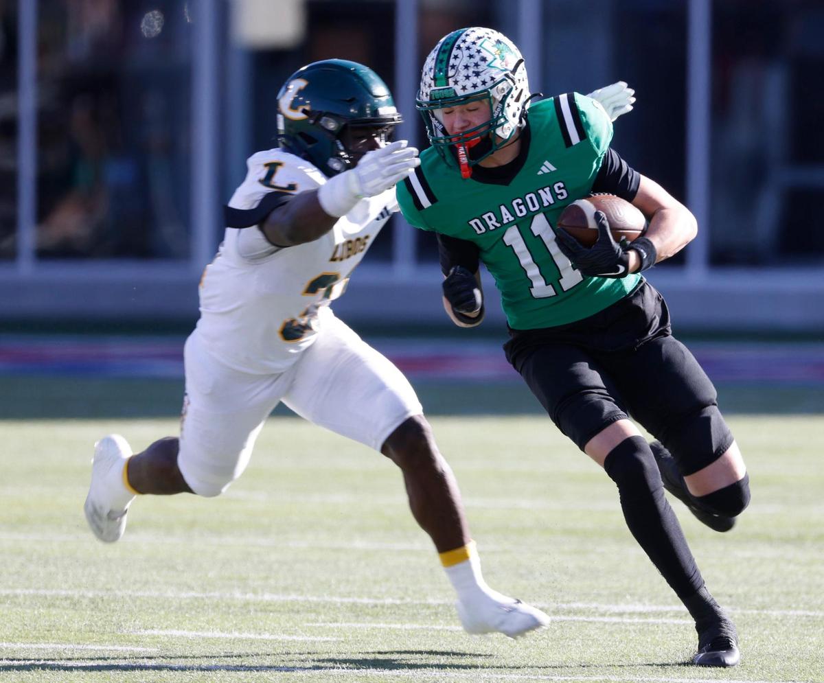 Southlake Carroll wide receiver Brock Boyd escapes a Longview defender during their Class 6A Division II state semifinal last season at Gerald J. Ford Stadium in Dallas.