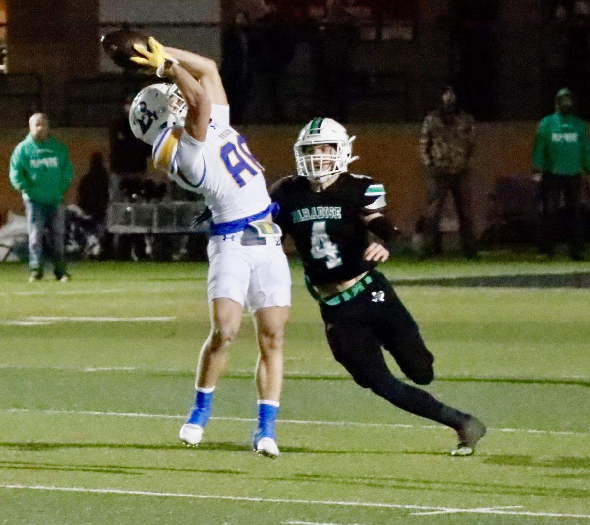 Brock wide receiver Britton Burrows (88) goes up for a reception over Paradise linebacker Blaine Watson (4) in a Class 3A Division 1 state quarterfinal on Friday, December 1, 2023 at Ram Stadium in Mineral Wells, Texas.