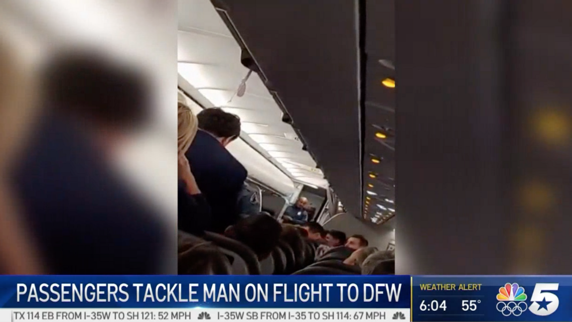 Man tries to open plane’s exit door on flight from Chicago to DFW, passengers say