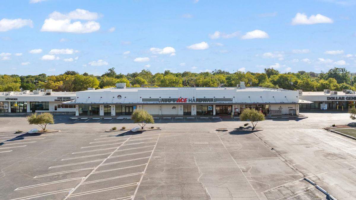 The restoration of the exterior of the Westcliff Shopping Center revealed the building’s original 1950s cast-stone facade, which had been preserved beneath a 1970s-era metal roof.