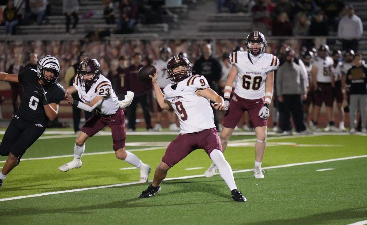 Whitesboro quarterback Rip Harper (9) lets it fly as Grandview’s Elijah Dominguez (0) tries to get past Camron Howard (23) on Thursday, November 14, 2024 at Mustang-Panther Stadium in Grapevine, Texas. Grandview defeated Whitesboro 54-17.