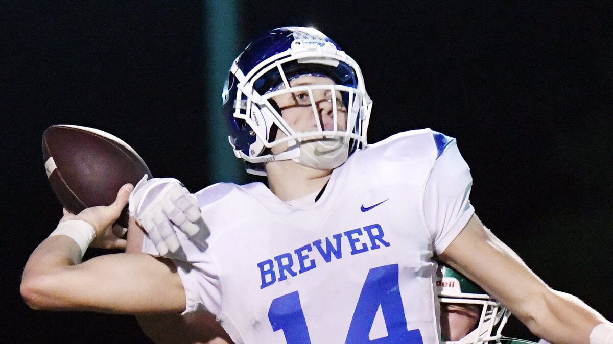 Brewer quarterback Adam Duncan, front is hit by Azle’s Weston Pyle as he tries to throw a pass in the fourth quarter of Friday’s  October 26, 2018 football game at Hornet Stadium in Azle, Texas. Azle went on to win 24-17. Special/Bob Haynes