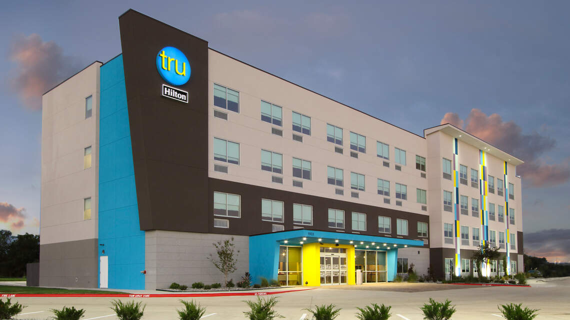 A new Hilton branded hotel is bringing trendy vibes to the Fossil Creek neighborhood