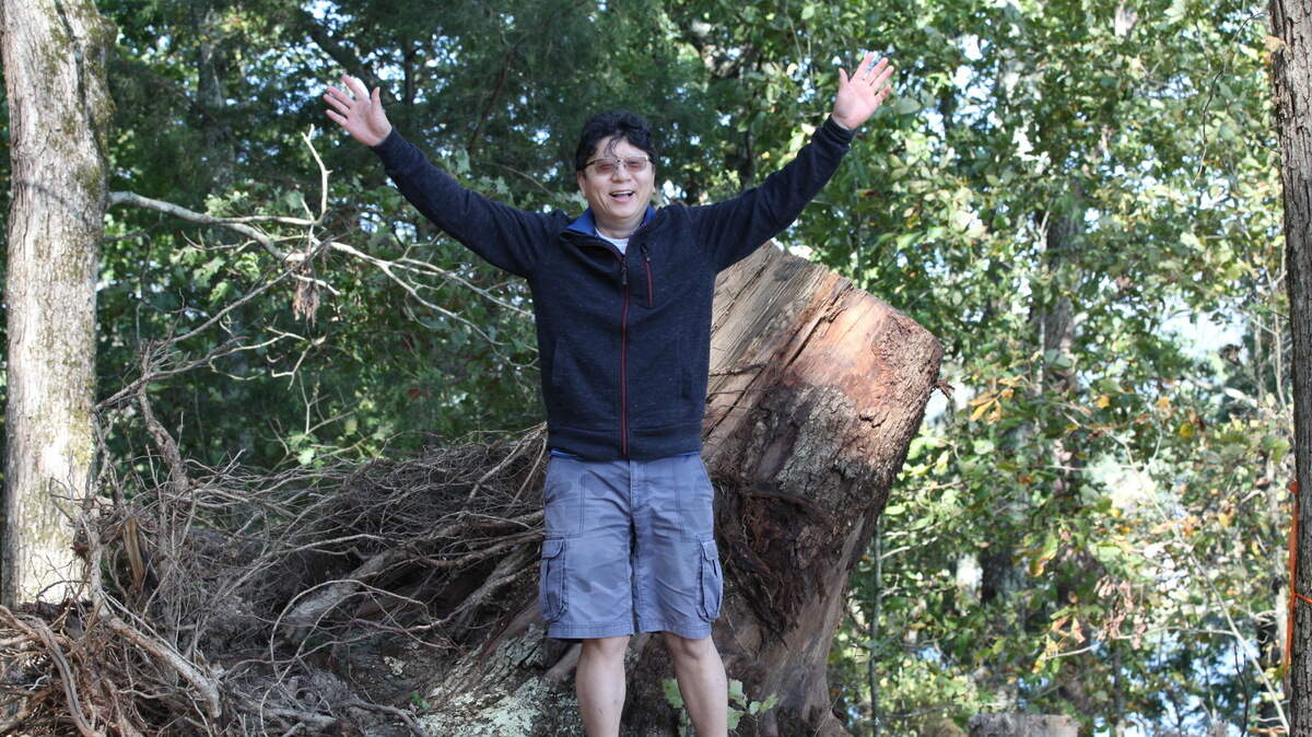 Feng Zhou smiles for a photo. The 58-year-old’s family is remembering him for his hard work and his kindness after he was killed in a hit-and-run crash in Keller on Saturday.