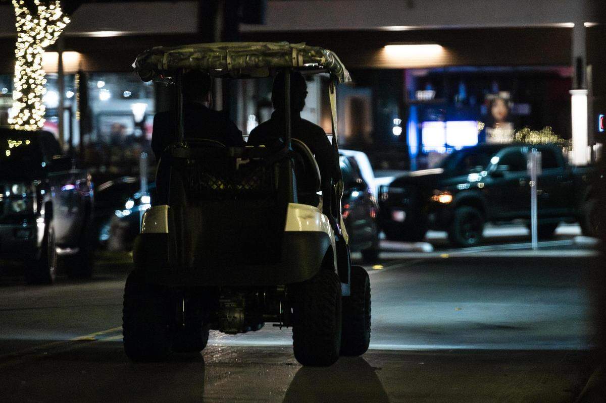 Security guards patrol the streets on golf carts on West 7th Street in Fort Worth on Friday, March 22, 2024. Out of a total of 3,197 crimes reported in Fort Worth’s entertainment districts from Jan. 1, 2023, to March 10, 2024, the largest number happened in the West 7th area, totaling 1,288.