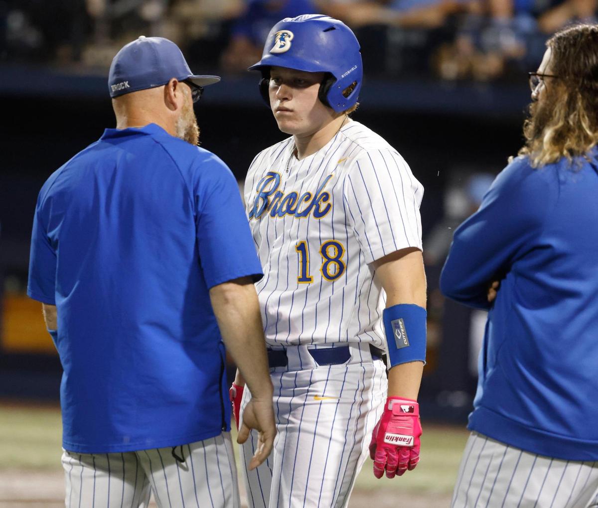 Brock head coach Koby Page talks with designated hitter Hudson Davis (18) during a time out at a UIL 4A D2 semifinal baseball game at Dallas Baptist University’s Horner Ballpark in Dallas, Texas, Thursday, May 29, 2025.