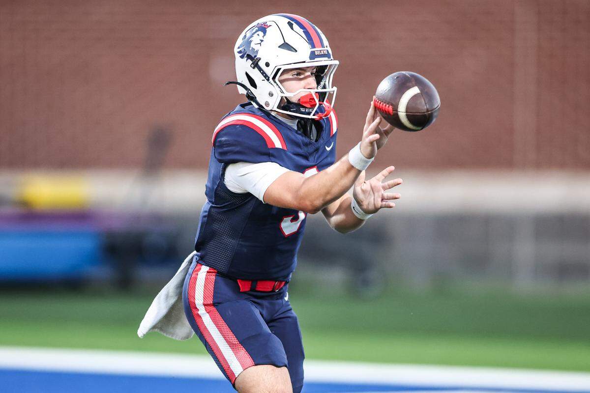 Richland quarterback Brett Kates pitches the ball in the Friday, Sept. 26, game at Birdville ISD FineArts/Athletics Complex.