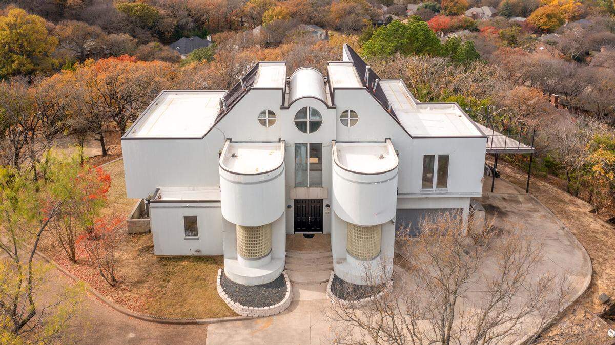 A 3,784-square-foot, four-bedroom Arlington home once owned by Pantera’s Vinnie Paul is for sale for $750,000.