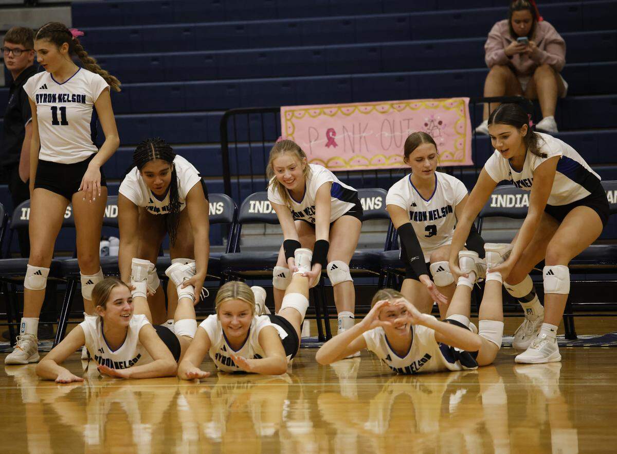 Byron Nelson players celebrate a point against Keller on Oct. 14 at Keller High School. Nelson is the No. 1-ranked high school volleyball team in the country.