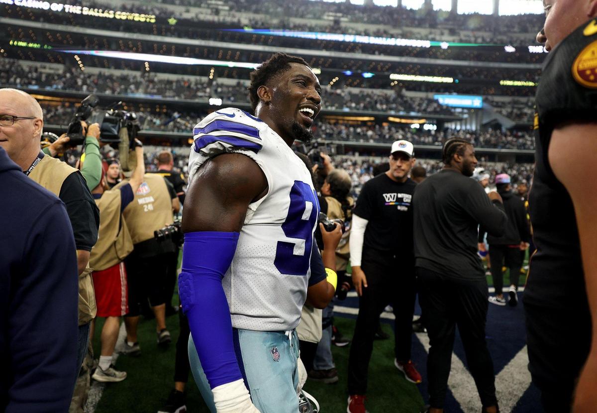 Defensive end DeMarcus Lawrence celebrates the Dallas Cowboys 25-10 win against the Washington Commanders on Sunday, October 2, 2022, at AT&T Stadium in Arlington.