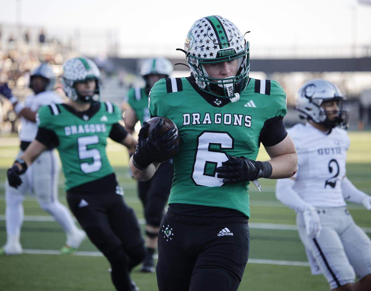 Southlake Carroll defensive back Parker Harris (6) scores against Denton Guyer during the second half of a UIL Class 6A Division II Quarterfinal on Saturday Dec. 06, 2025 at Crowley ISD Multi-Purpose Stadium in Fort Worth, Texas.