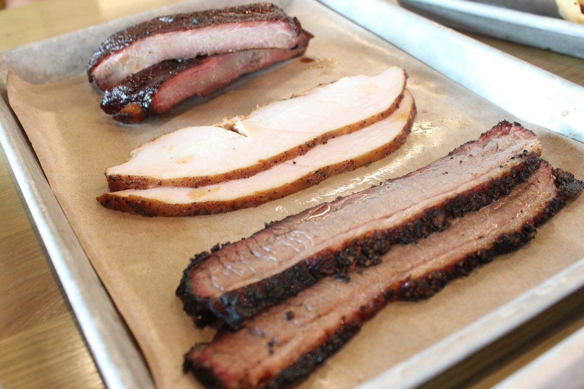 Loop 9 holy trinity, pork ribs (left), smoked turkey (middle) and prime brisket (right).