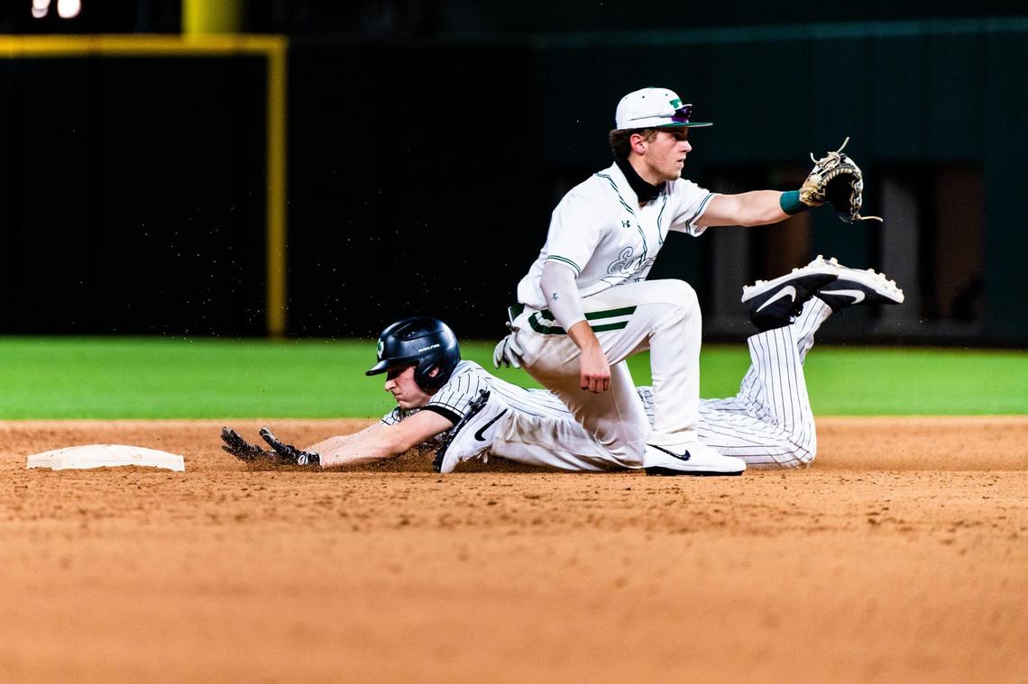Tanner Sumer (19) steals 2nd base during a game between Carroll and Prosper at Globe Life Field in Arlington during the High School Baseball Showcase on February 28, 2021. Photo by Matt Smith. (Special to the Star-Telegram).