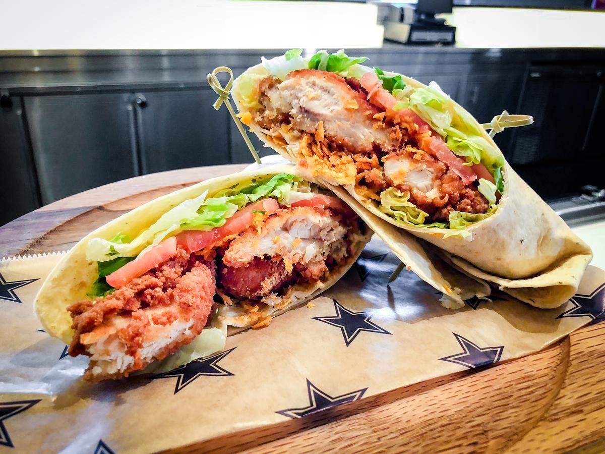 Doritos Chicken Wrap, chicken strips sprinkled with nacho cheese Doritos in a tortilla wrap.