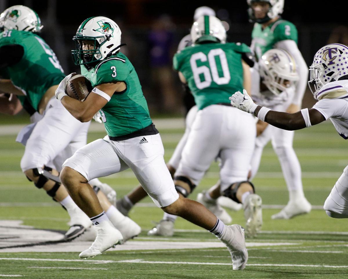 Southlake Carroll’s Davis Penn breaks free for a long run in the second quarter during a UIL football game at Dragon Stadium on Friday, Sept. 27, 2024.