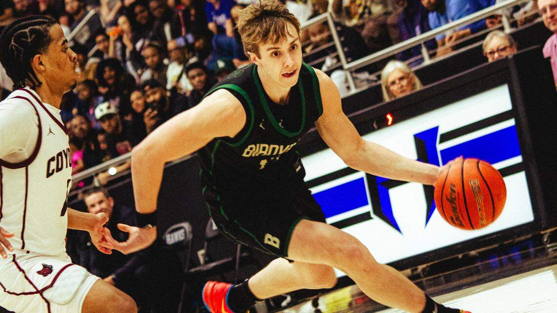 NRH Birdville’s Avery Webb dribbles around a Frisco Heritage defender in a Class 5A Division I state semifinal on Tuesday at Hebron High School in Carrollton.