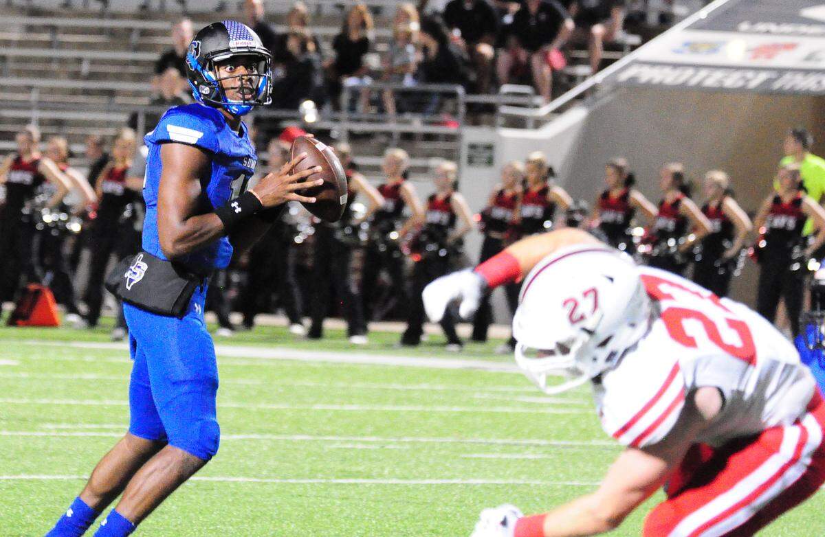 Mansfield Summit quarterback Brysen McKinney, left, in action earlier this season, and the Jaguars fell 45-24 Friday night to South Grand Prairie to create a five-way tie atop District 7-6A.