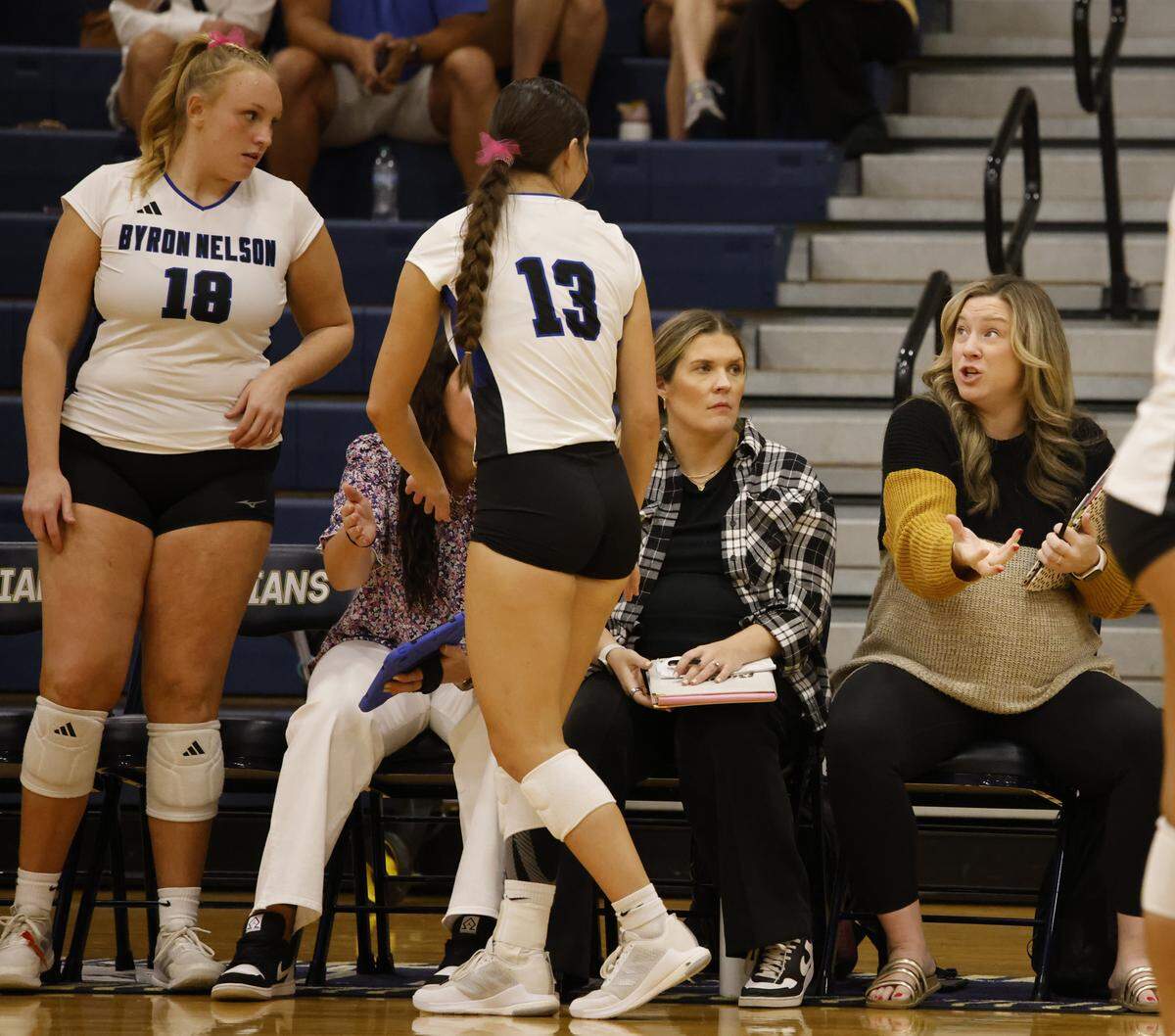 Byron Nelson head coach Brianne Groth offers some instruction.