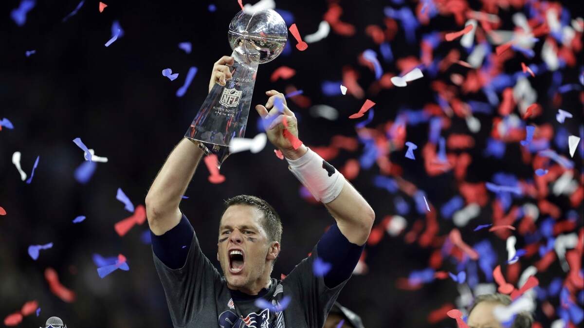 Tom Brady raises the Vince Lombardi Trophy after defeating the Atlanta Falcons in overtime in Super Bowl 51 in 2017. Brady will play in his 10th Super Bowl when his Tampa Bay Buccaneers play the Kansas City Chiefs on Sunday in Tampa, Fla.