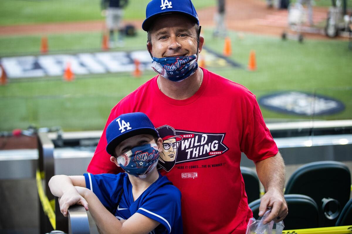 Mike McKinish from Oklahoma came to support his team with his son, Montgomery, at game 2 of the World Series Wednesday, Oct. 21, 2020, at Globe Life Field in Arlington.