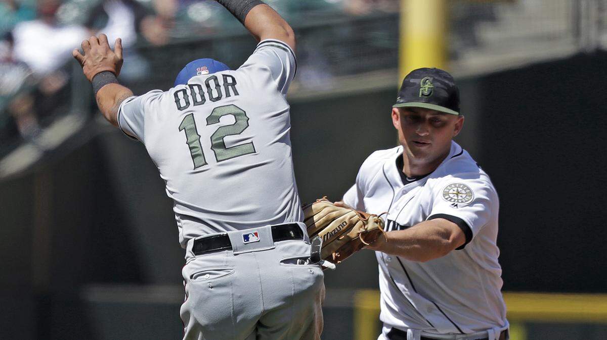 Rougned Odor was tagged out by Mariners third baseman Corey Seager on a key pickoff/caught stealing that helped doom the Rangers on Monday.