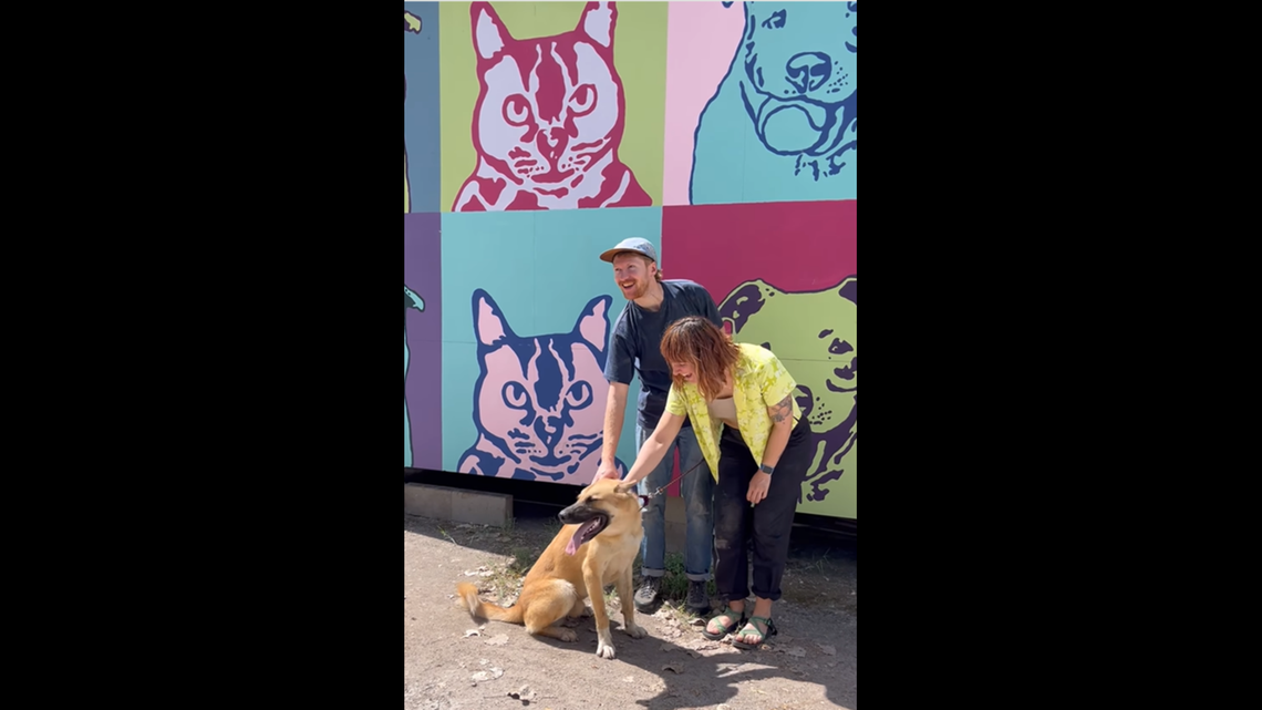 Drew and his partner greet Julius.