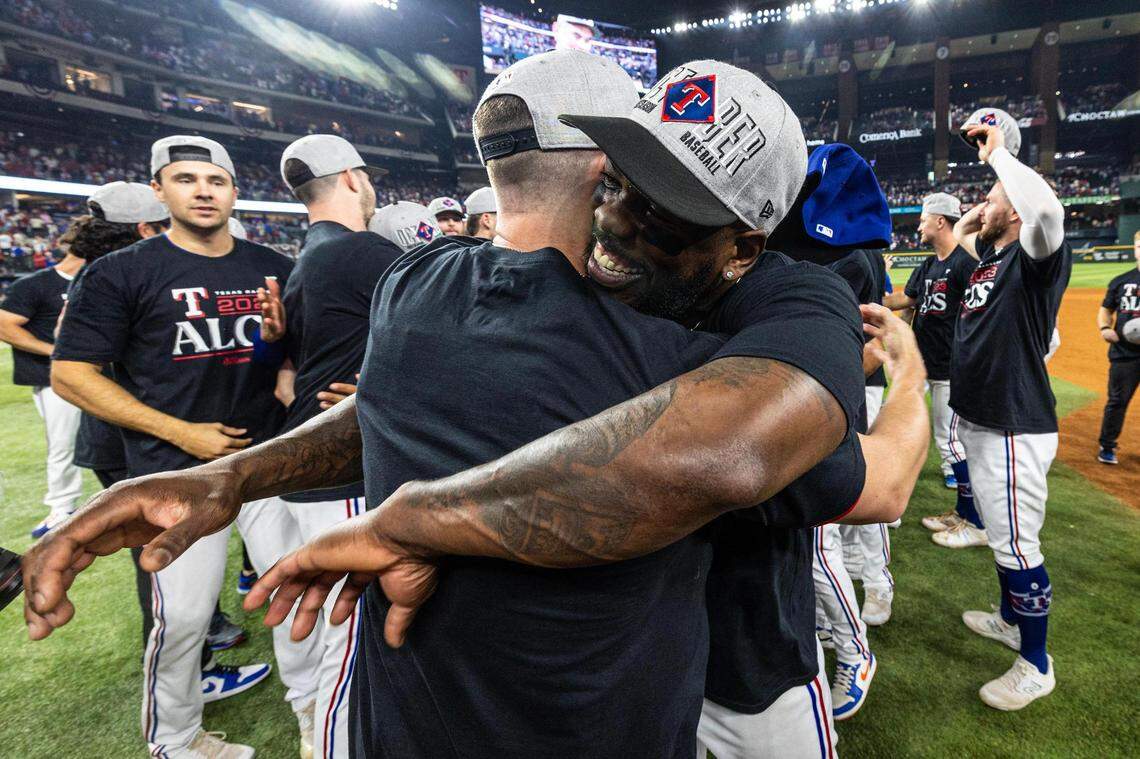 Texas Rangers outfielder Adolis Garcia celebrates with his teammates after winning game three to clinch the ALDS between the Texas Rangers and Baltimore Orioles at Globe Life Field in Arlington on Tuesday, Oct. 10, 2023.