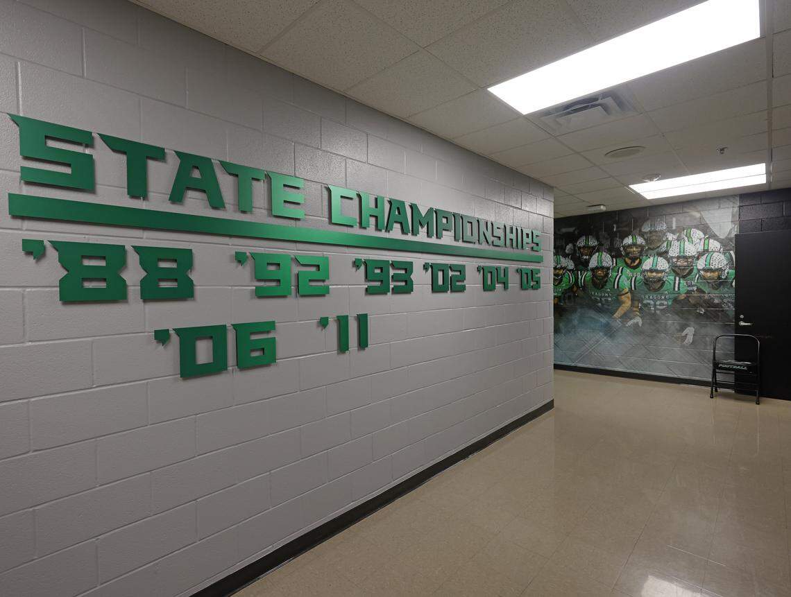 The years of Southlake Carroll football’s eight state titles are displayed on a wall