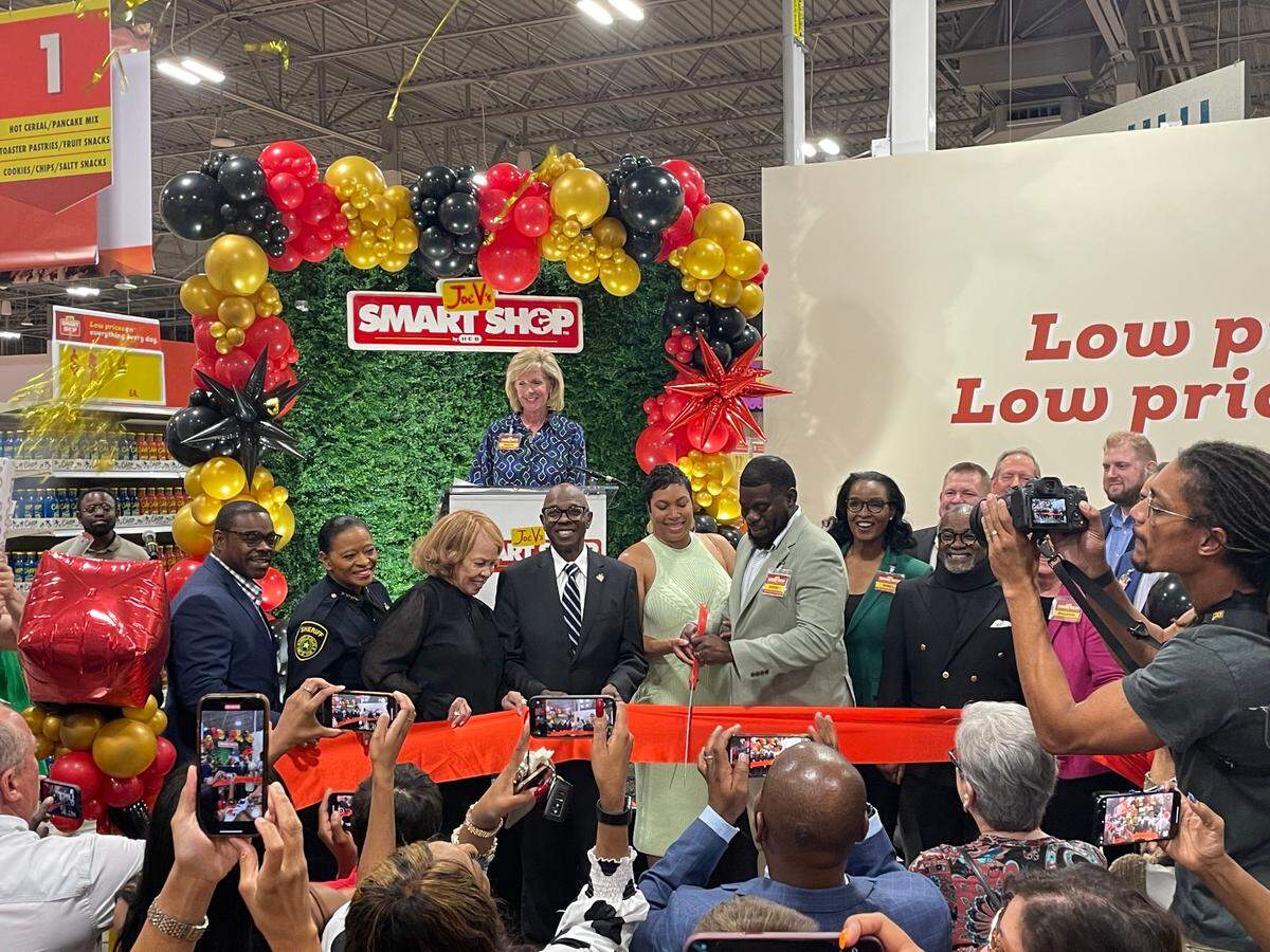 H-E-B executives and Dallas community members cut the ribbon of the new Joe V's Smart Shop in Dallas. 