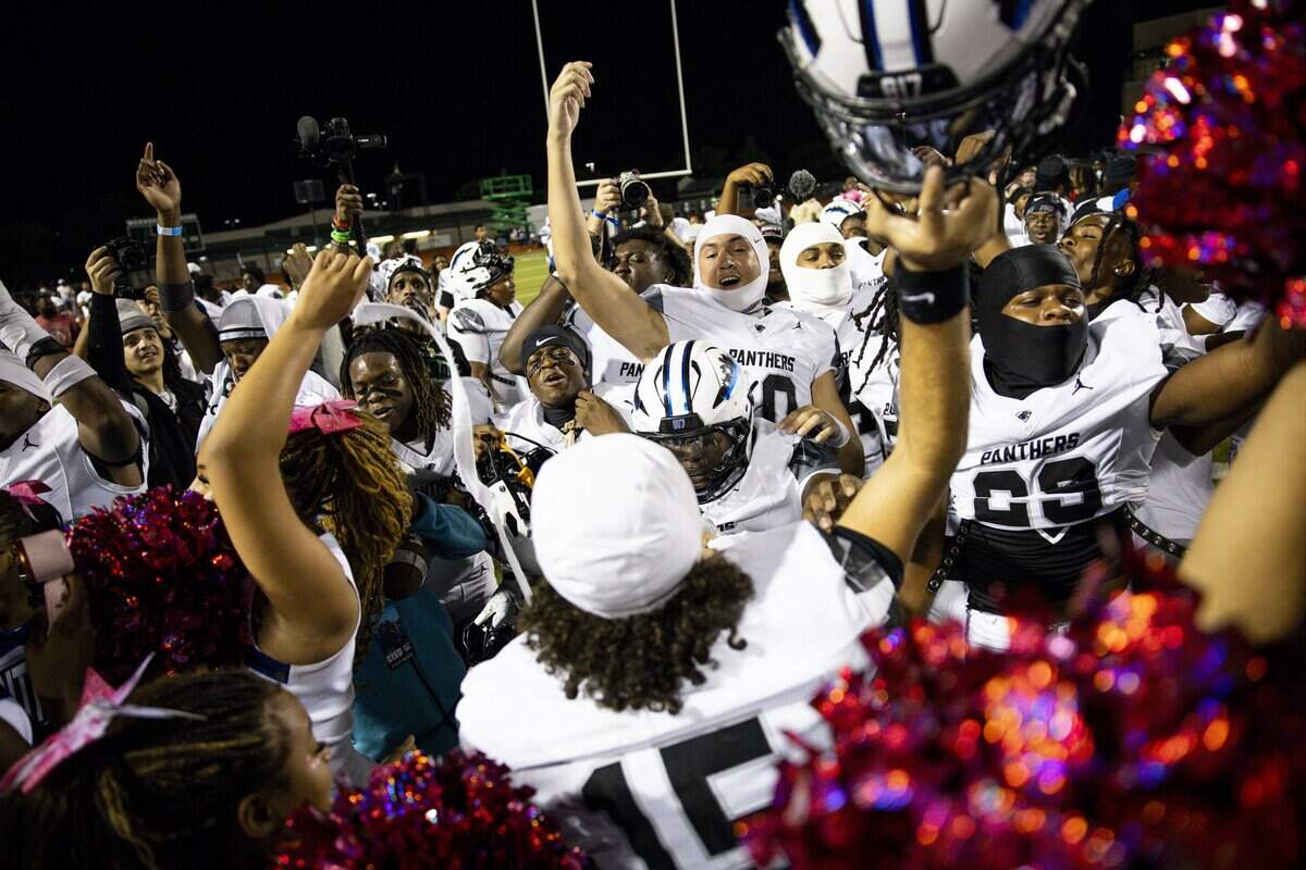 North Crowley football players and cheerleaders celebrate defeating Waxahachie, 42-17, on Friday, Oct. 9, 2026, at Stuart B. Lumpkins Stadium in Waxahachie.