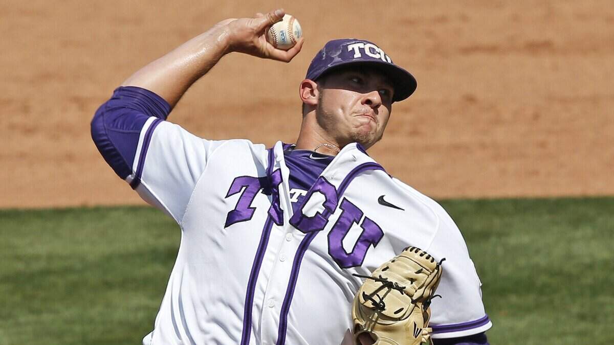 TCU's Riley Ferrell pitches in the ninth inning of a first-round game against Baylor in the Big 12 conference NCAA college baseball tournament in Oklahoma City, Wednesday, May 21, 2014.