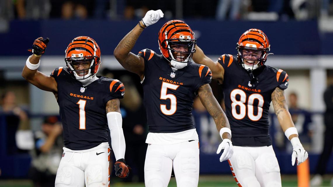 Cincinnati Bengals Ja’Marr Chase (1), Tee Higgins (5) and Andrei Iosivas celebrate a touchdown during the fourth quarter against the Dallas Cowboys on Monday, Dec. 9, 2024, at AT&T Stadium in Arlington. Higgins can be a free agent after the season and he will be in demand.