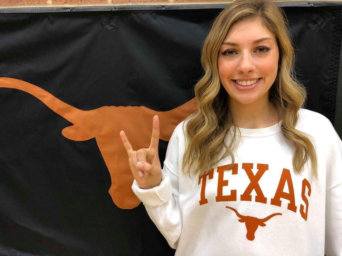 Mansfield senior hitter Molly Phillips signs with Texas last month.
