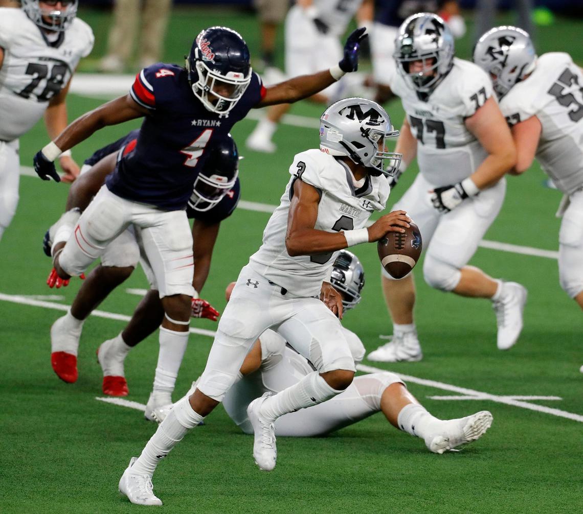 Martin quarterback Cydd Ford (3) scrambles around the right side during a high school football game at AT&T Stadium in Arlington, Texas, Friday, Sept. 25, 2020. Denton Ryan defeated Arlington Martin 47-24. (Special to the Star-Telegram Bob Booth)