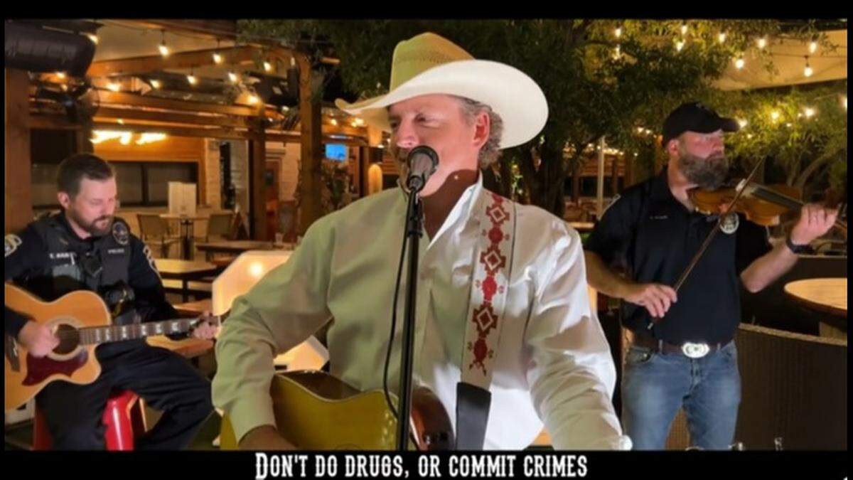 Derek Spence and the Tribute to George Strait are performing a Southlake police recruiting video. The video has attracted dozens of applications to work as a Southlake police officer.