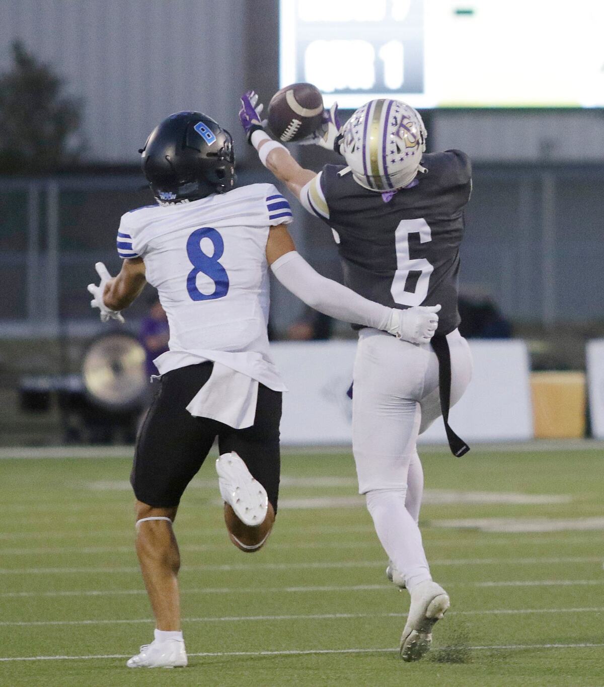 Timber Creek’s Tyler Gowins comes down with interception on a pass intended for Ezra Malamute Trophy Club’s during a UIL football game at Keller ISD Stadium on Thursday, October 3, 2024.
