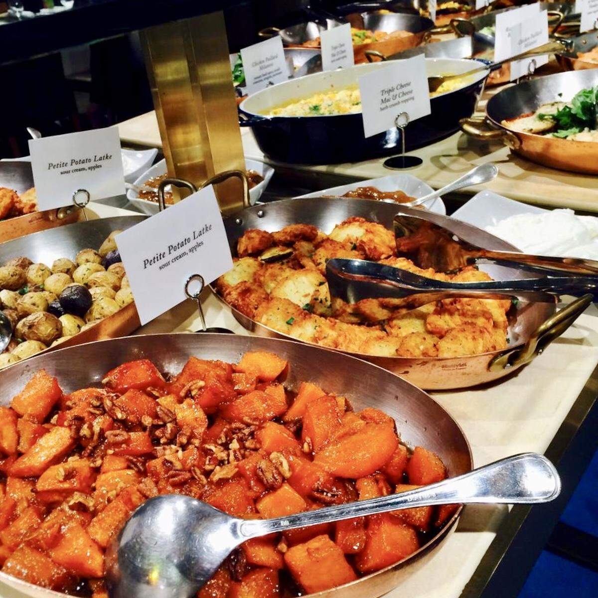 Potato latkes are among the items on the daily holiday buffet at the Zodiac inside the downtown Dallas Neiman Marcus.
