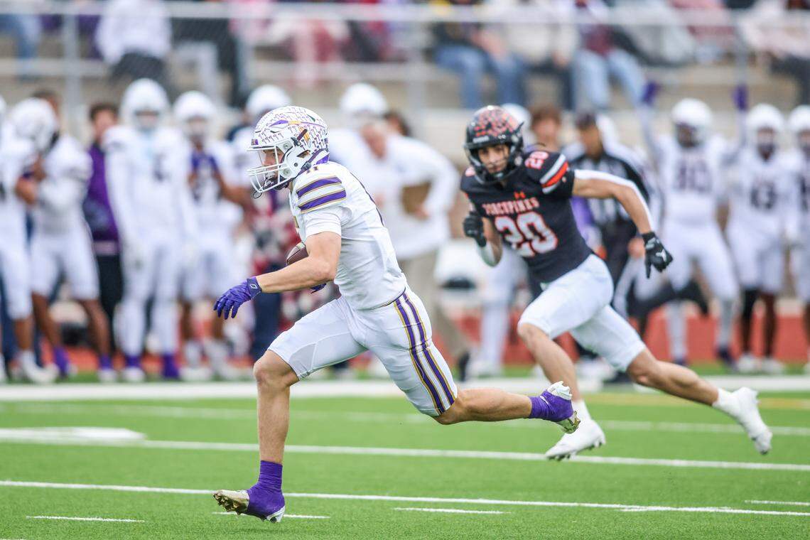Alvarado receiver Paijton Fox makes a long reception to set up a touchdown during a Class 4A Division I regional semifinal Friday, Nov. 28, 2025, at Knight Stadium at Eagle Mountain High School in Fort Worth.