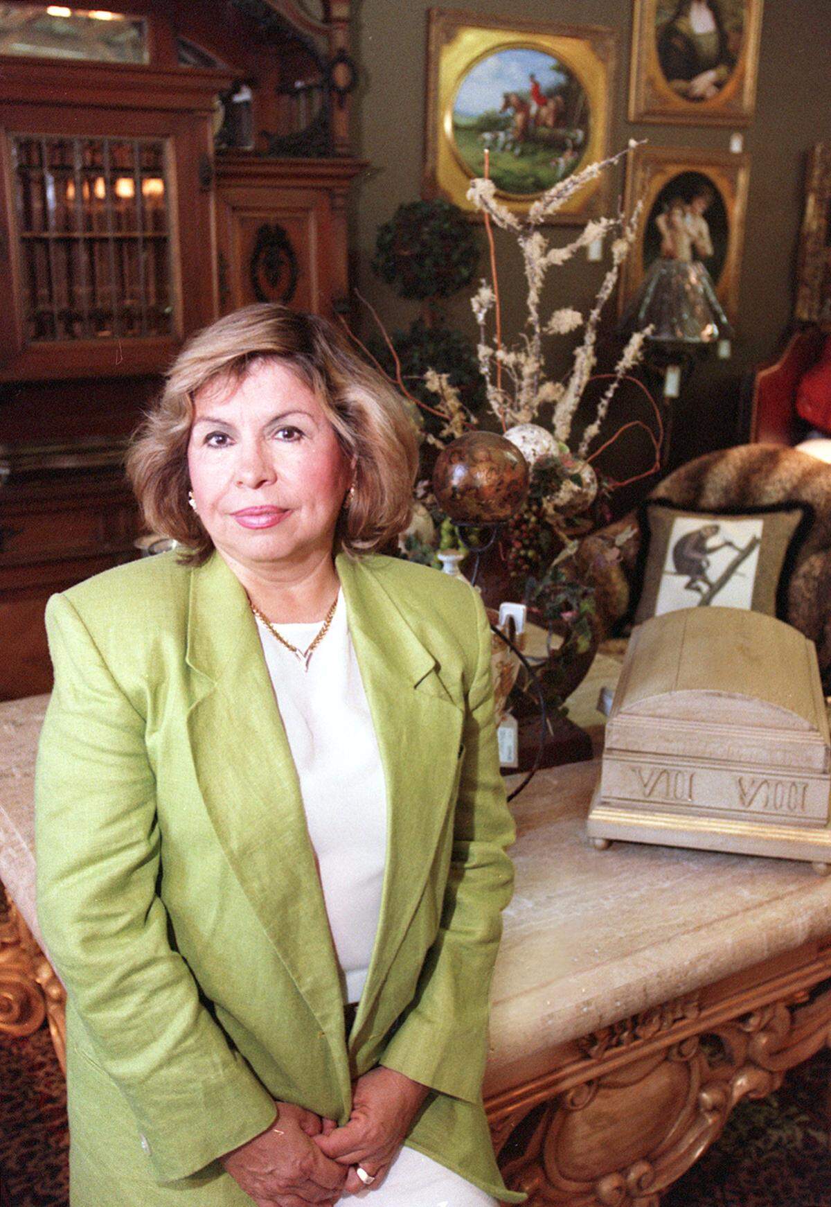 Deyla Guadiana of J&D Interiors poses in one of the many showrooms in her store. She has been in business in Fort Worth since 1976.