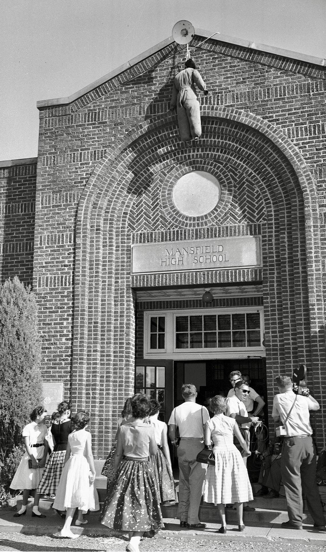An effigy, the second at the school, was left hanging from the roof over the door of Mansfield High School Aug. 31, 1956. It hung there for days and only white students enrolled during a school desegregation incident.
