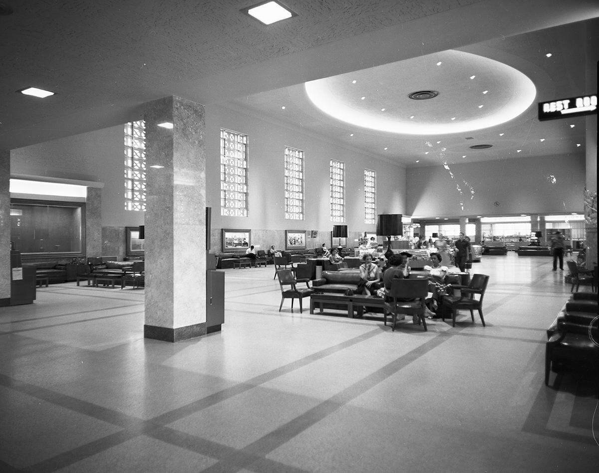 1953: The Greater Fort Worth International Airport lobby in the airport with couches and chairs.